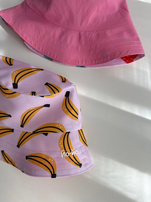Reversible children's bucket hat with UV protection - bananas