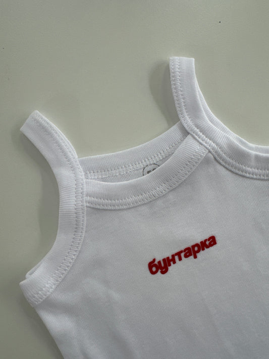Baby bodysuit with the inscription "rebel"
