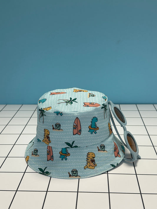 Reversible children's bucket hat with UV protection - hand-painted design - dinosaurs