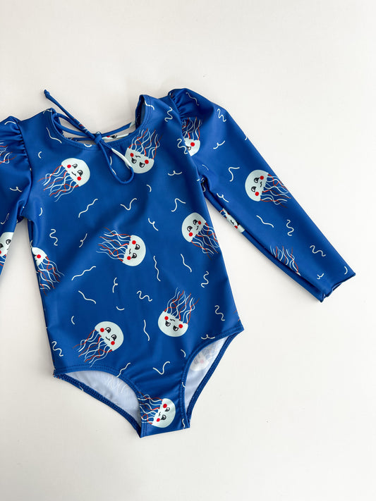 MARINA - Детски цял бански с дълъг ръкав и UV защита (UPF 50+) - JELLY FISH BLUE SS26