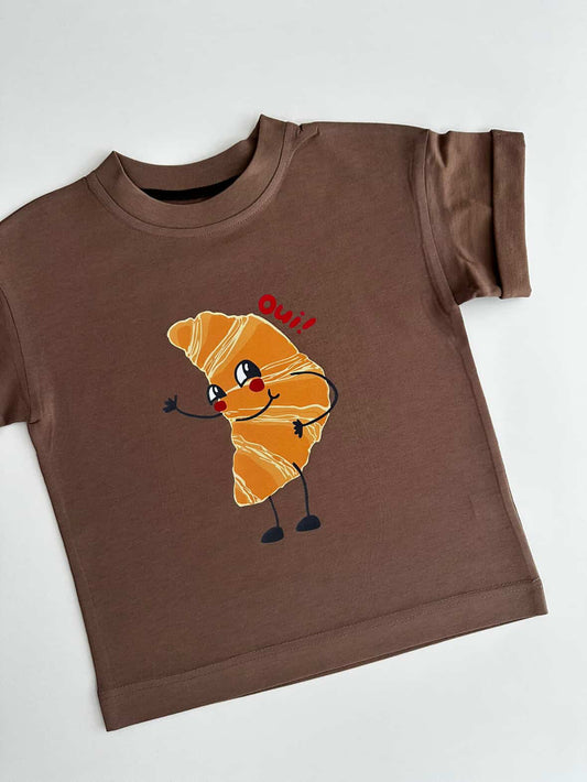 Детска оувърсайз тениска “oui” - мока (SS26)