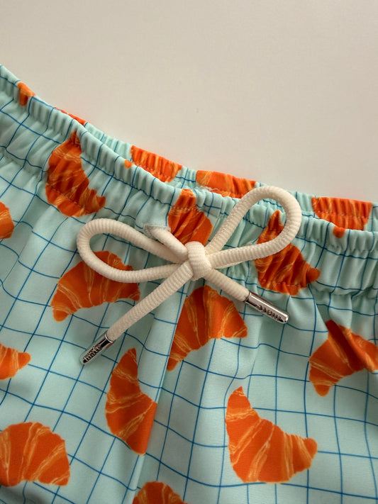 NOA - детски сърф шорти с UV защита (UPF 50+) - кроасани светло син SS26